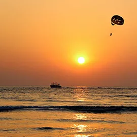 Watching the sun go down from the Kollam beach