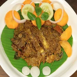 Karimeen Pollichathu